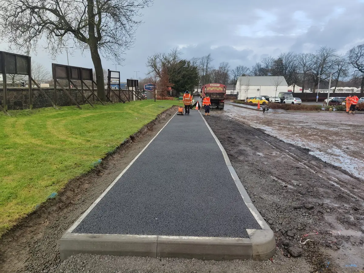 Kerbed tarmac pathway installation