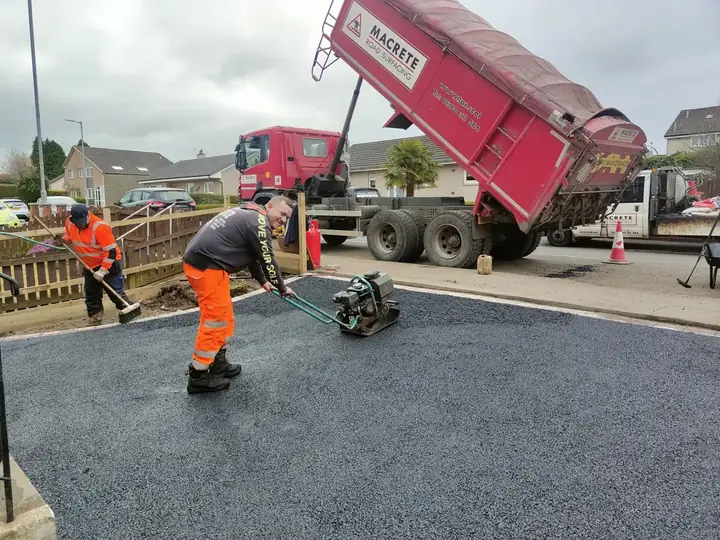 Commercial asphalt surfacing of a business forecourt in Glasgow, Scotland